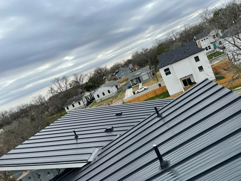 Standing seam metal roof panels with vents for Skylight Repair in Gering